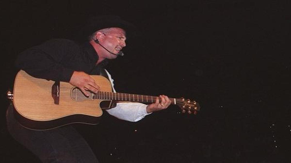 Country star Garth Brooks plays to an enthusiastic, sellout crowd in the first of five shows at the Selland Arena in 1997. After Brooks’ 1992 show at the arena, his crew left town without him.