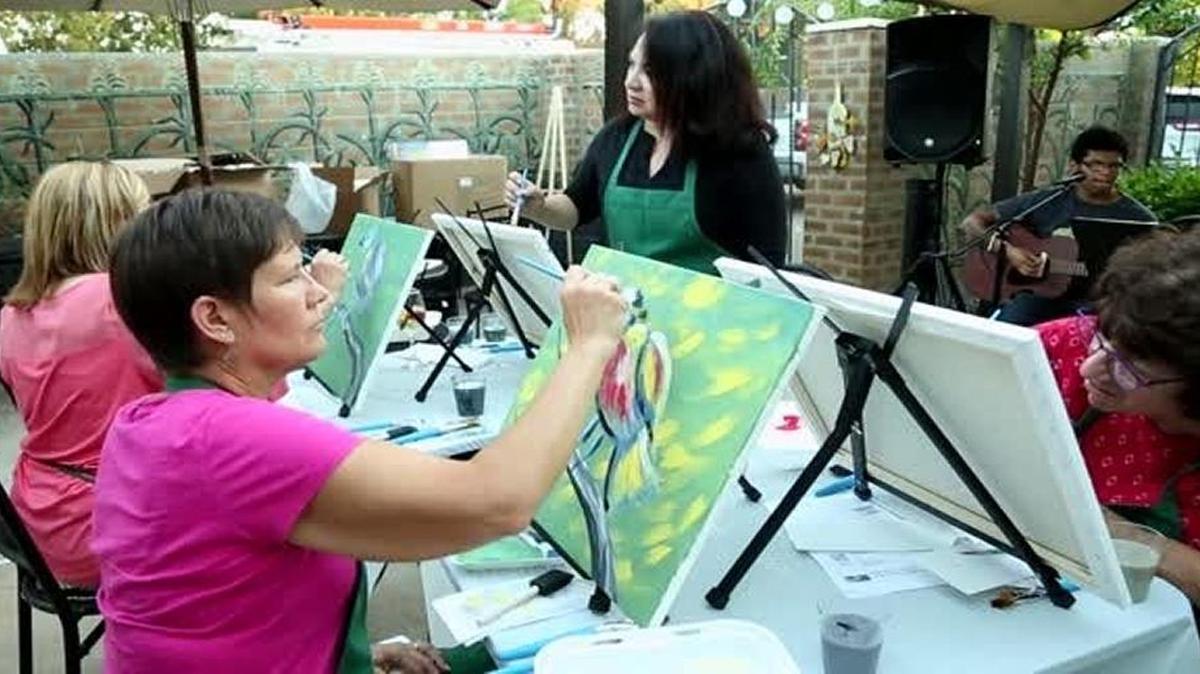 Painters participate in a 2016 “Canvas and Cordials Paint Party” fundraiser in Clovis. A similar event is scheduled Wednesday night at Mia Cuppa Cafe.