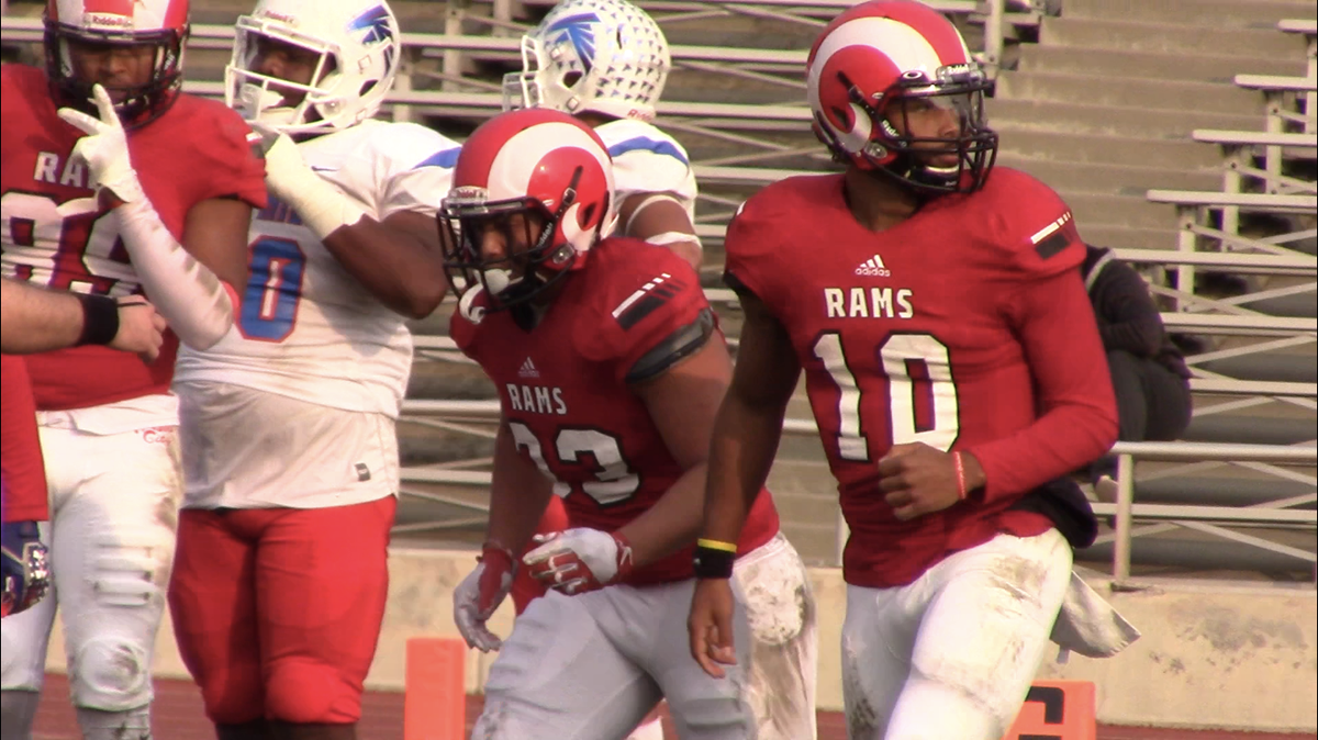 Fresno City College football team, led by Jonah Johnson, right, finished the season 9-3 that included a Valley Conference title. The Rams won a playoffs game before falling to Laney 24-7 in the Northern California championship on Nov.  24, 2018.