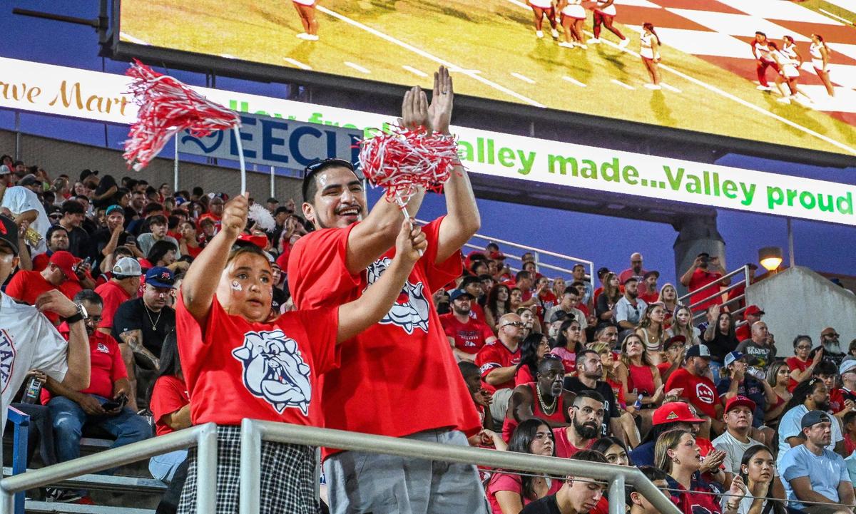 Fans cheer on the Bulldogs during their home-opener against Sacramento State at Valley Children’s Stadium on Saturday, Sept. 7, 2024.