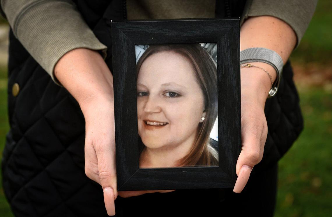 Sarah Rodriguez holds a photo of her cousin Calley Jean Garay, on Dec. 31, 2020. Calley was killed by her husband outside a clinic in Madera in July in front of their three young children. Sarah has been fighting for the custody of the three children, but Madera County CPS has now placed them with Calley’s alleged murderer’s son, who was arrested in 2018 for domestic violence.