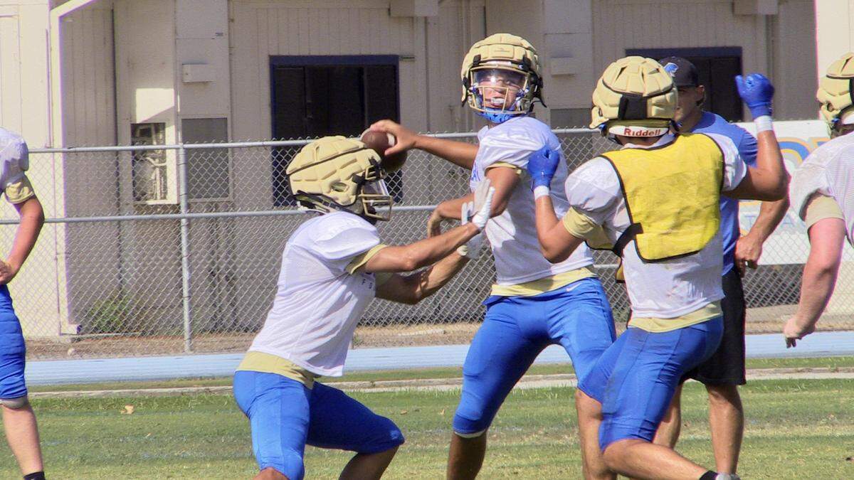 Quarterback Deagan Rose during a Clovis High football practice.