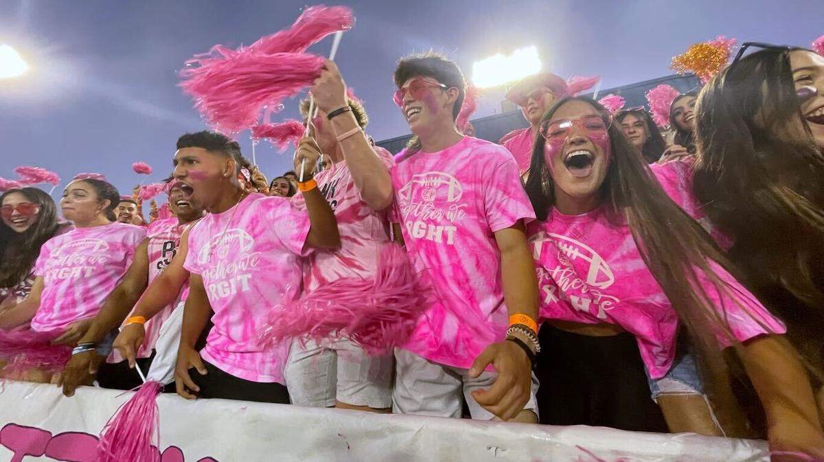 Central High’s student section revs up the spirit before the start of Friday night’s high school football game against Buchanan.