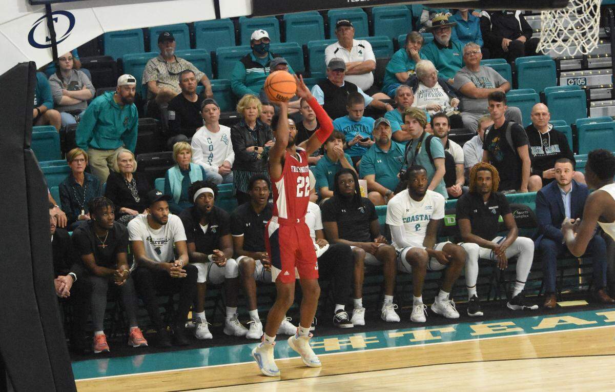 Fresno State guard Destin Whitaker lines up a shot from the 3-point line in the Bulldogs’ 85-74 victory over Coastal Carolina on Friday in the championship game of The Basketball Classic in Conway, S.C.