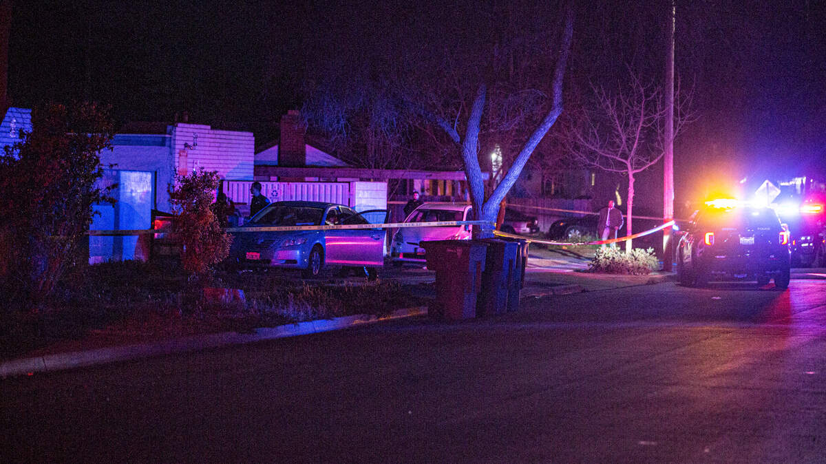 Police tape off sidewalk after a woman was shot in a drive-by shooting near College and Fedora avenues on Thursday, Feb. 24, 2022.