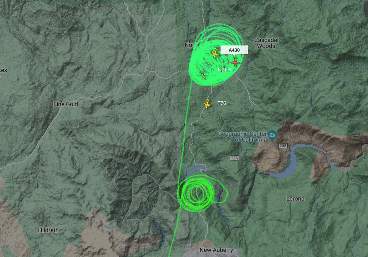 The flight path of a U.S. Forest Service aircraft appears to circle wildfires occurring around Kerckhoff Lake near Auberry and near North Fork around 4:30 p.m. Wednesday, Sept. 7, 2022.