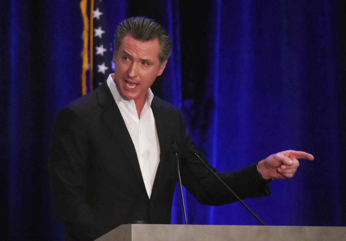 California Governor Gavin Newsom speaks at the California Economic Summit in Fresno. Newsom has ordered an eviction ban, but renters who can’t pay now will have to pay landlords later.