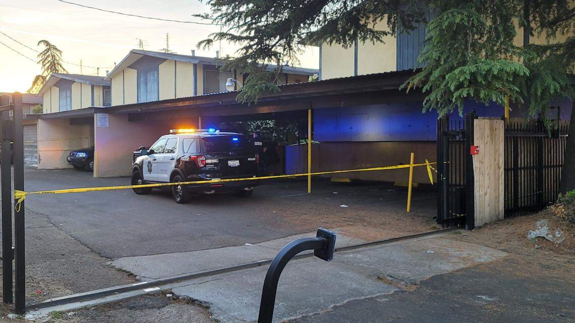 Fresno police investigate at an apartment complex where officials say a woman was stabbed to death by her son Thursday. The man was arrested.