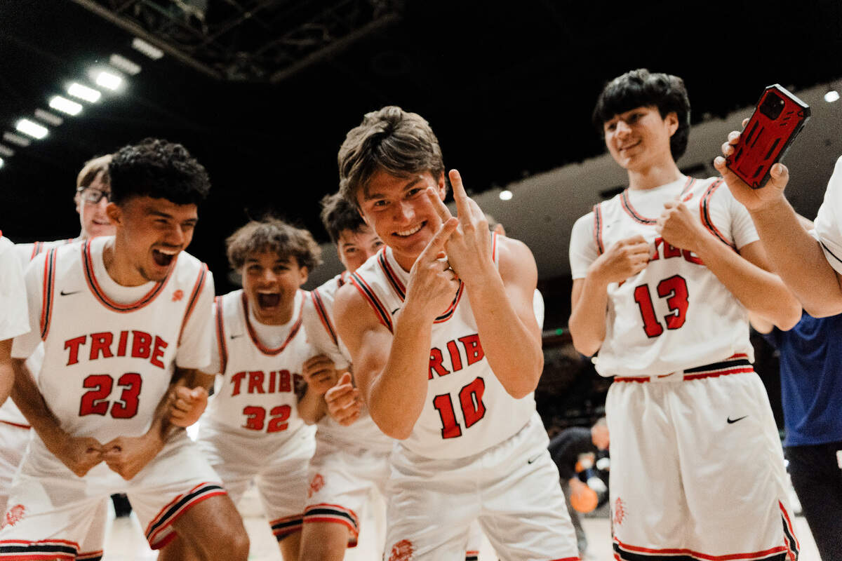 Chowchilla’s Benson Soares sizes up his finger after the Tribe defeated Fowler 63-59 in a Central Section Division VI title game.