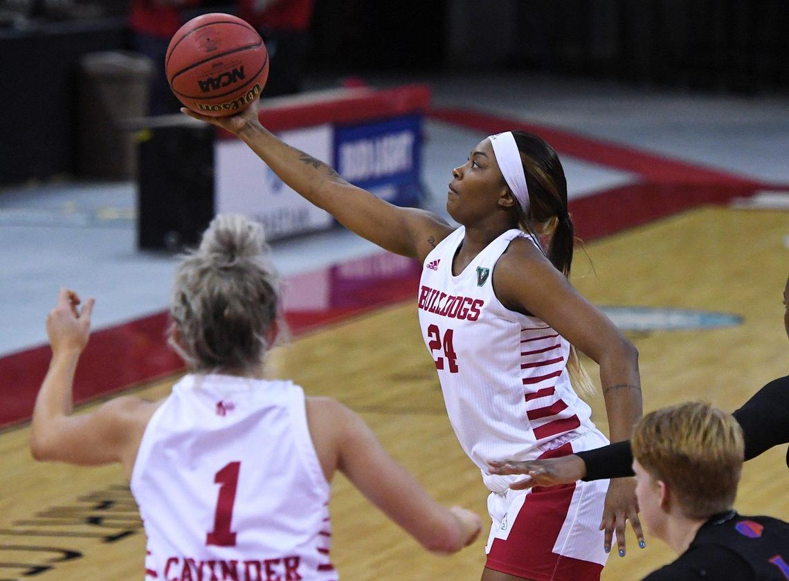 Fresno State’s Wytalla Motta reaches for the ball against Boise State on Saturday afternoon, Jan. 23, 2021 in Fresno. The Bulldogs went on to win the second game of the series 67-64.