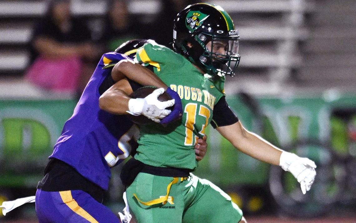 Fresno’s Brian Venegas, left, tackles Roosevelt’s Giovanny Alvarez Friday, Nov. 1, 2024. Roosevelt beat Fresno 54-12.
