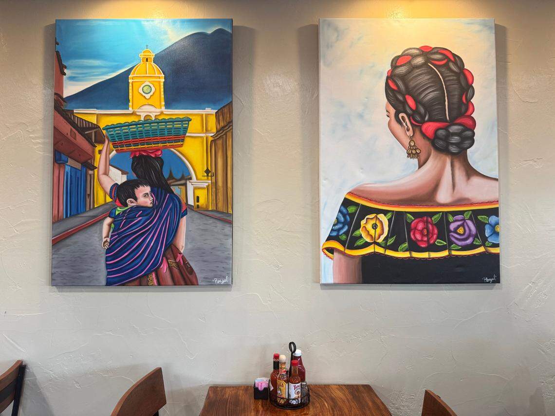 Paintings on one of the walls of the dinner area at the new Clovis location.