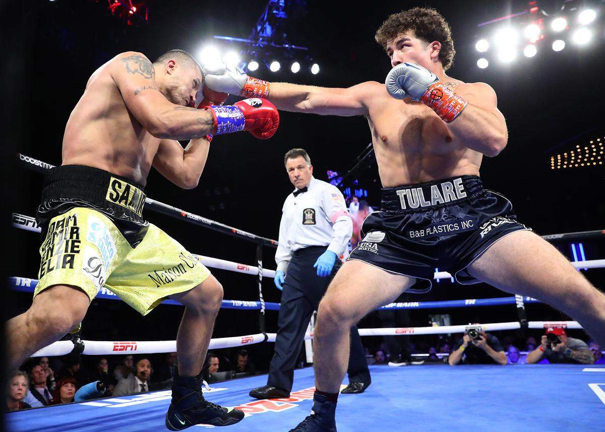 Ahmed Hefny, left, and Richard Torrez Jr., right, exchange punches during their heavyweight fight at The Hulu Theater at Madison Square Garden on October 29, 2022 in New York City.