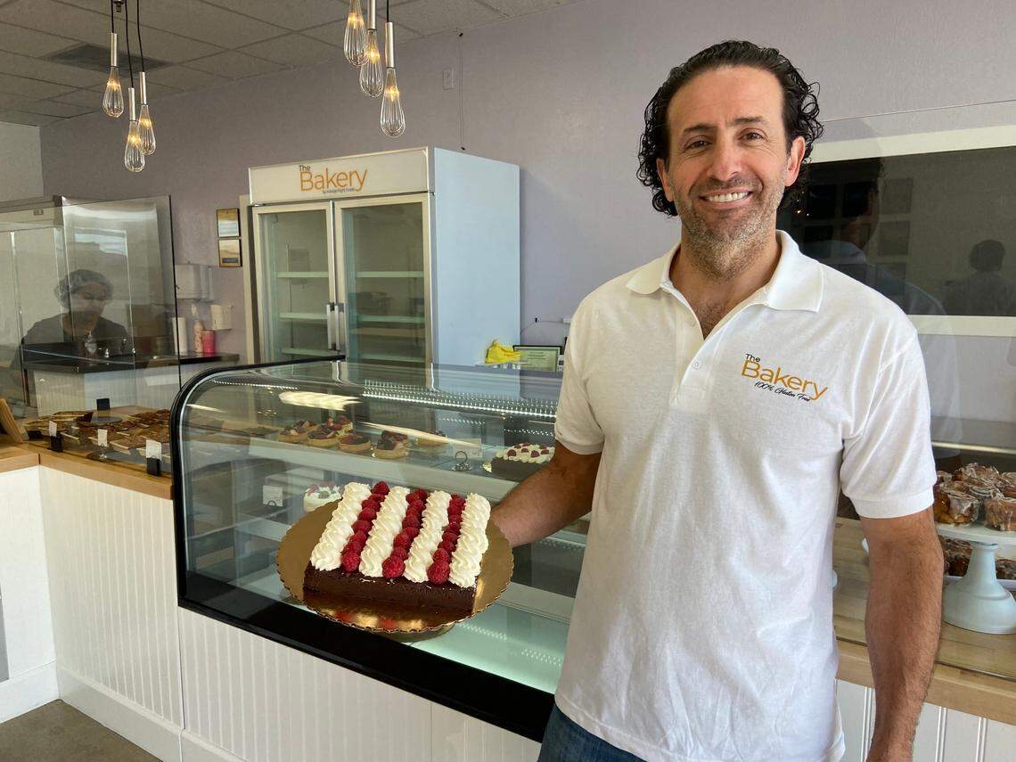 CEO/president Varouj Kachichian displays a chocolate cake at The Bakery by Indulge Right Foods, a 100% gluten-free bakery.