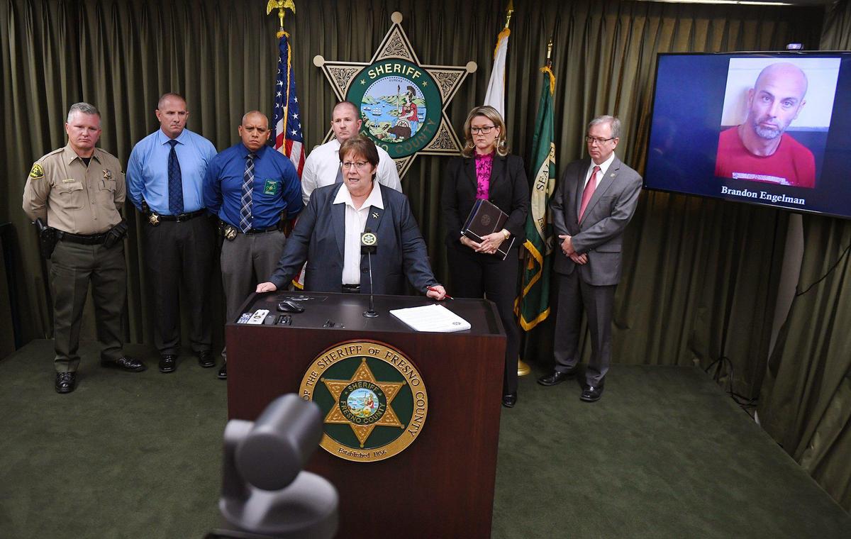 Fresno County Sheriff Margaret Mims, center, with District Attorney Lisa Smittcamp to the right of Mims, announces the arrest of Brandon Engelman at a press conference Friday, May 14, 2021 in Fresno