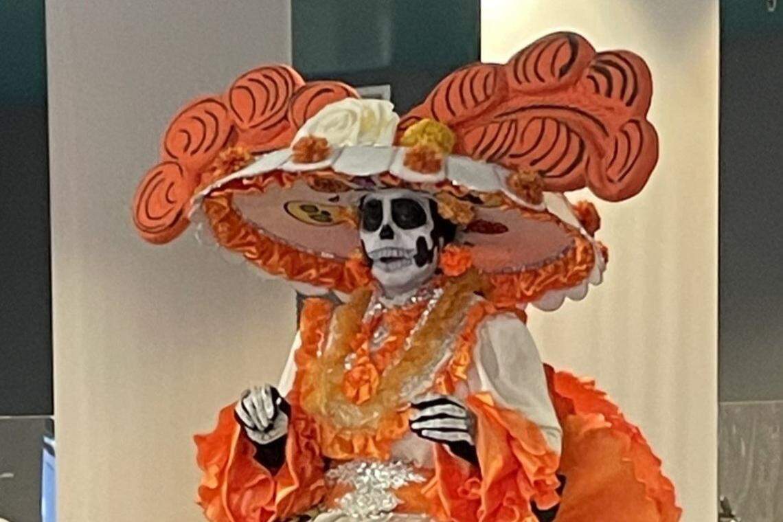 Leticia Valencia has brought La Catrina of Visalia to life for over a decade. She and her husband, Claudio Martínez, create the dresses La Catrina wears each year.