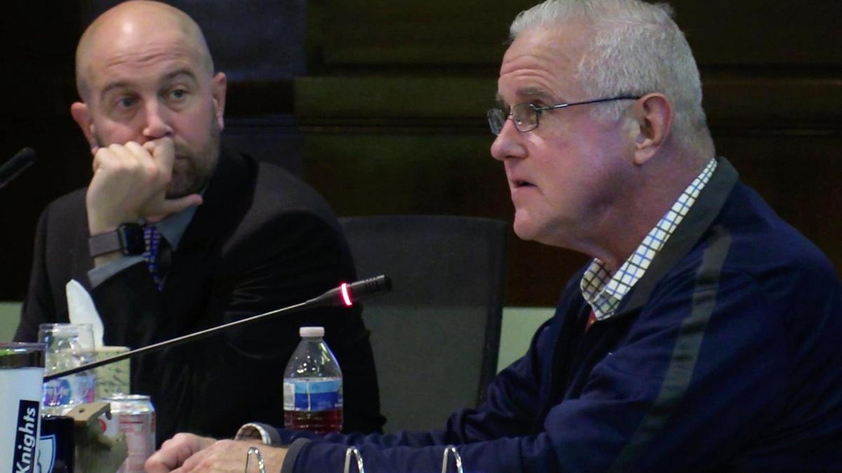 Fresno Unified School District trustee Terry Slatic, right, at his last board meeting, asks questions with board member Andy Levine to the left on Wednesday, Dec. 7, 2022 in Fresno. Slatic lost in the Nov. 8 election and will be replaced by retired FUSD school psychologist Susan Wittrup.