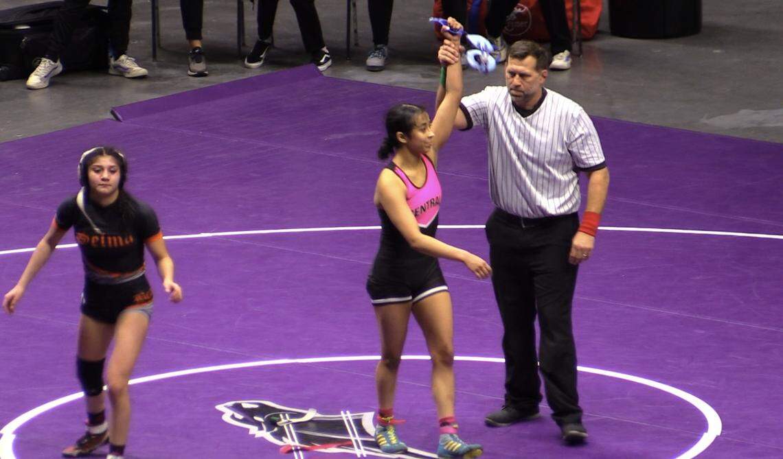 Megan Morales of Central wins her wrestling match against Kailey Salazar of Selma in 107 pounds at the Central Section Masters at Selland Arena in Fresno, California on Saturday, Feb. 17, 2024.