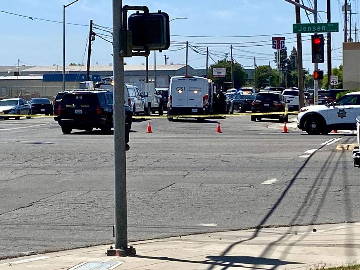 Emergency personnel respond to a shooting near Highway 41 and Jensen Avenue on Friday, May 24, 2024.