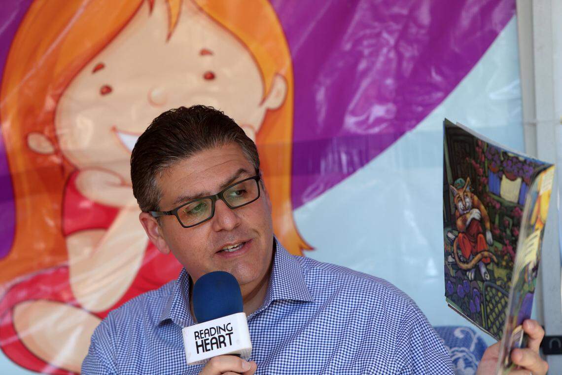 Fresno State President Joseph I. Castro read 'Chato's Kitchen' to children at the fourth annual Feria de la Educación activities Oct. 20 at Fresno State.
