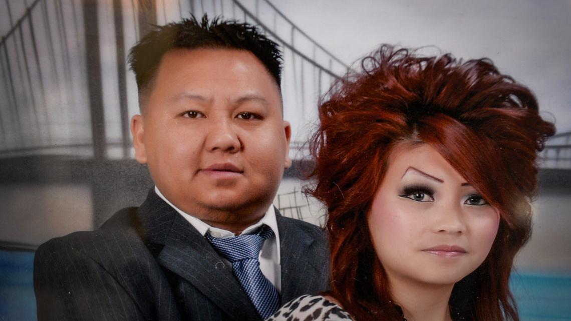 Shooting victim Kou Xiong is pictured with his wife Mai Shoua Yang in this handout photograph from his family.