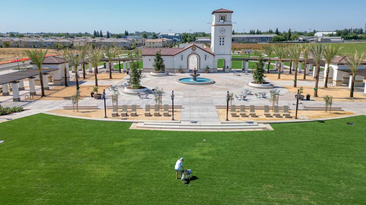 Village Green is a 7-acre park in the Loma Vista area of Clovis that has been planned for more than two decades. City officials envision the Village Green as a new “community hub” for special events. The space features a clock tower, a grass amphitheater, food truck spaces, a water feature, trellises, evening lighting, walking paths, bike racks, restrooms, drinking fountains and seating areas.