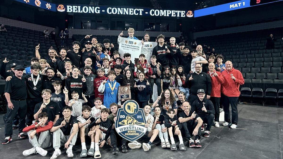 The Buchanan High boys and girls wrestling teams poses for a photo. The boys won a state title in Bakersfield on March 1, 2025.