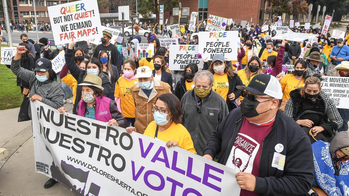 Hundreds of marchers led by civil rights activist Dolores Huerta arrive Saturday, Dec. 4, 2021, at the Fresno County Courthouse during a solidarity march to “demand fairness in California’s redistricting.”
