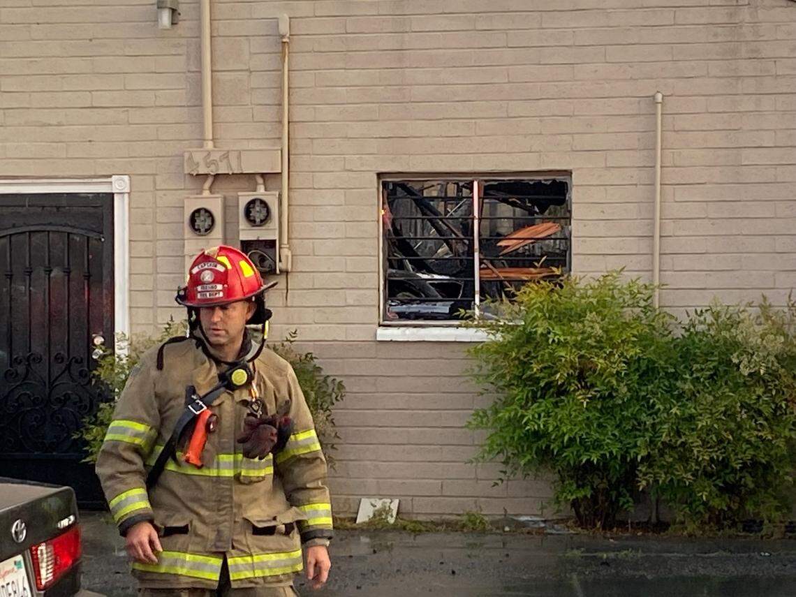 Fresno Fire Department cleans up after a fire destroyed a commercial building on Pine near Maple avenues about 4:30 a.m. Friday, March 22, 2022, according to firefighters.