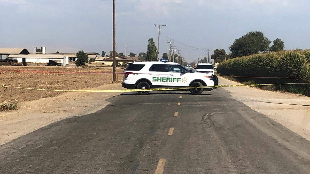 The Tulare County Sheriff’s Office investigates a homicide near Visalia, CA on Tuesday, Sept. 3, 2019.