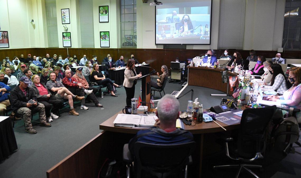 Speakers take turns addressing the board at the Fresno Unified School Board meeting Wednesday night, Feb. 16, 2022 in Fresno.