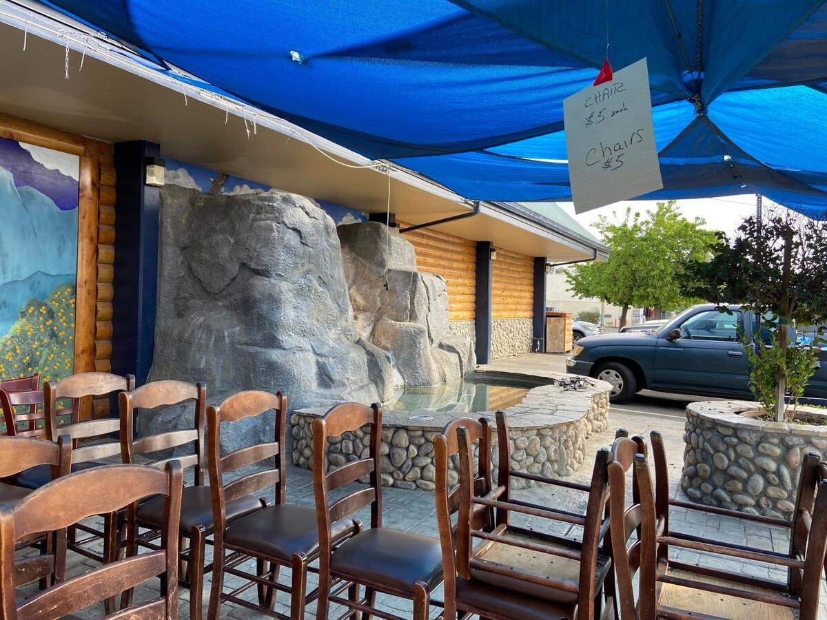 Chairs were for sale for $5 each at Yosemite Falls Cafe on Ashlan Avenue shortly after it closed in spring of 2022. Its other locations are still open.