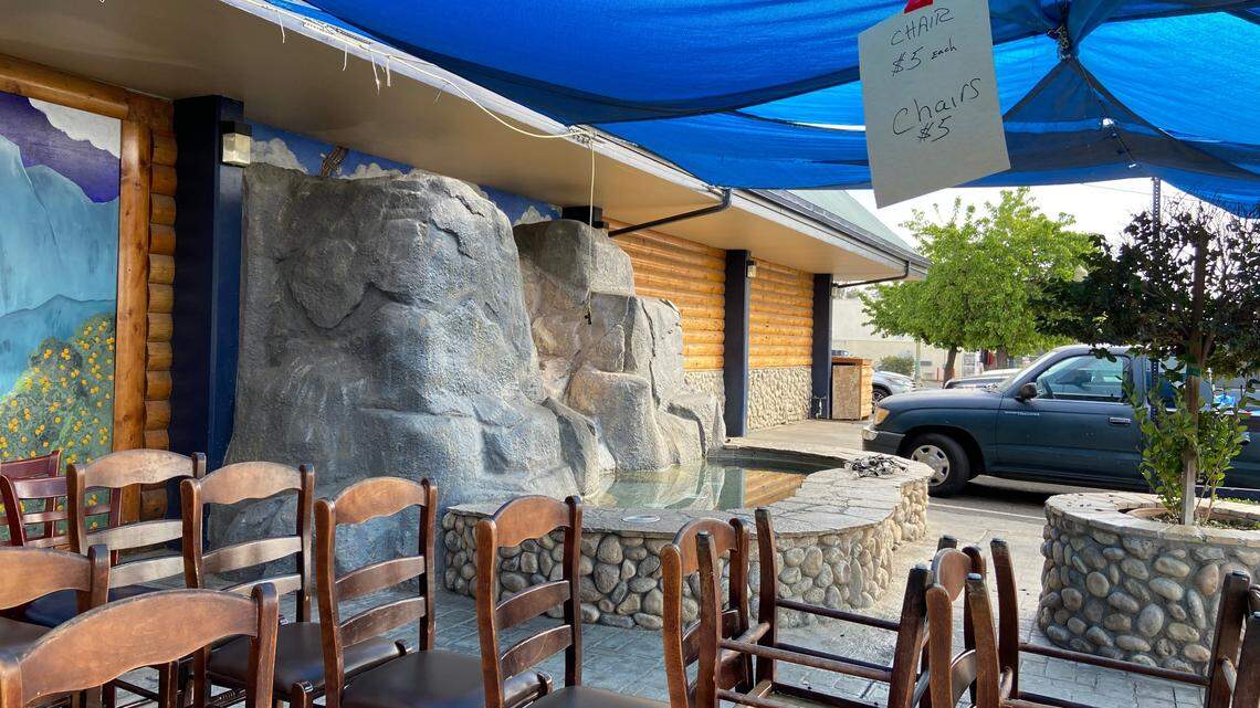 Chairs are for sale for $5 each at Yosemite Falls Cafe on Ashlan Avenue. The restaurant has closed, citing rising costs.