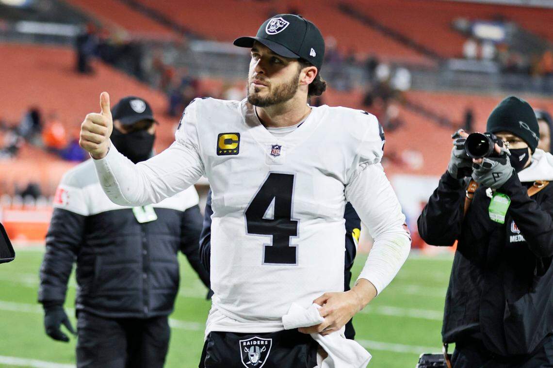Las Vegas Raiders quarterback Derek Carr gives a thumbs-up after his team defeated the Cleveland Browns in an NFL game, Monday, Dec. 20, 2021, in Cleveland.