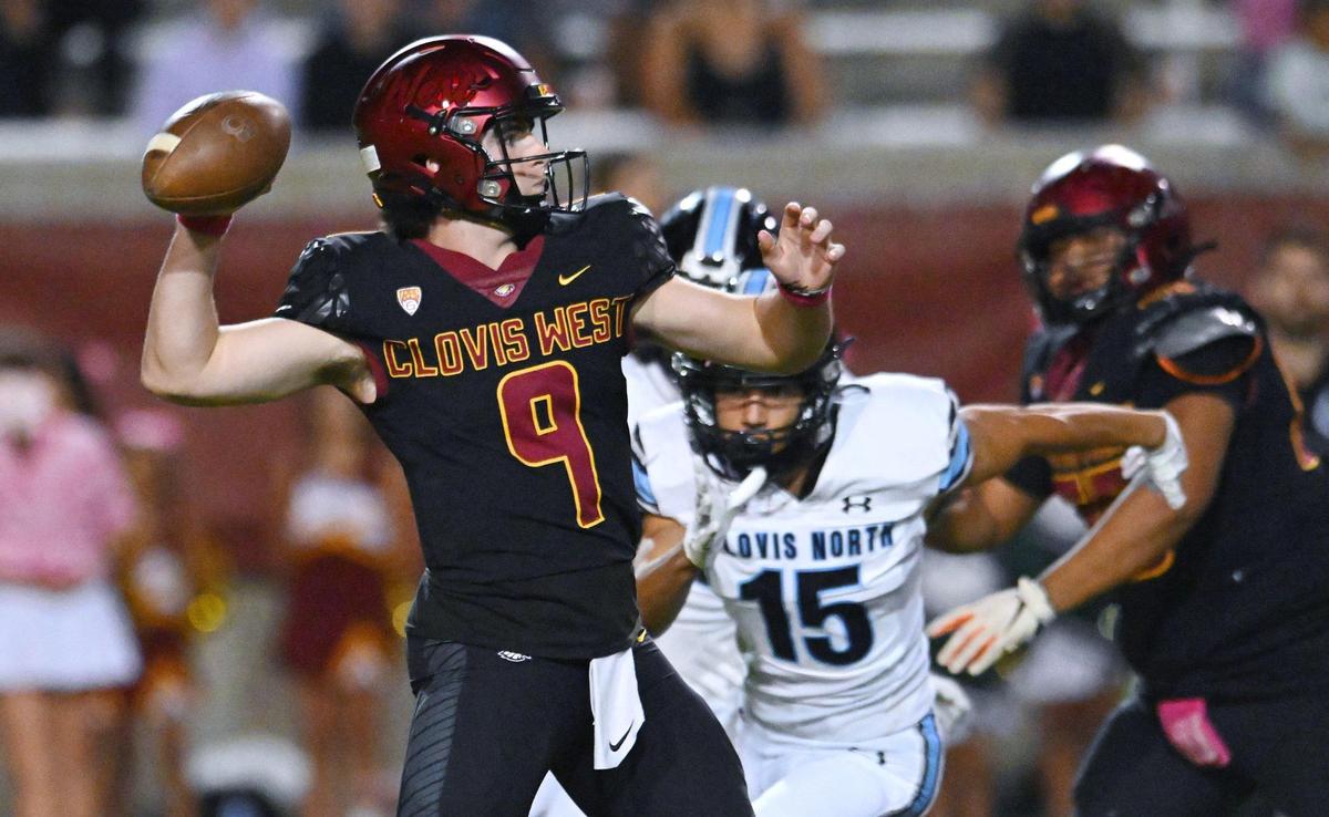 Clovis North’s Domenic Mercurio rushes in the background as Clovis West quarterback Tyler Patrick passes in TRAC action Friday, Oct. 13, 2023, in Clovis.
