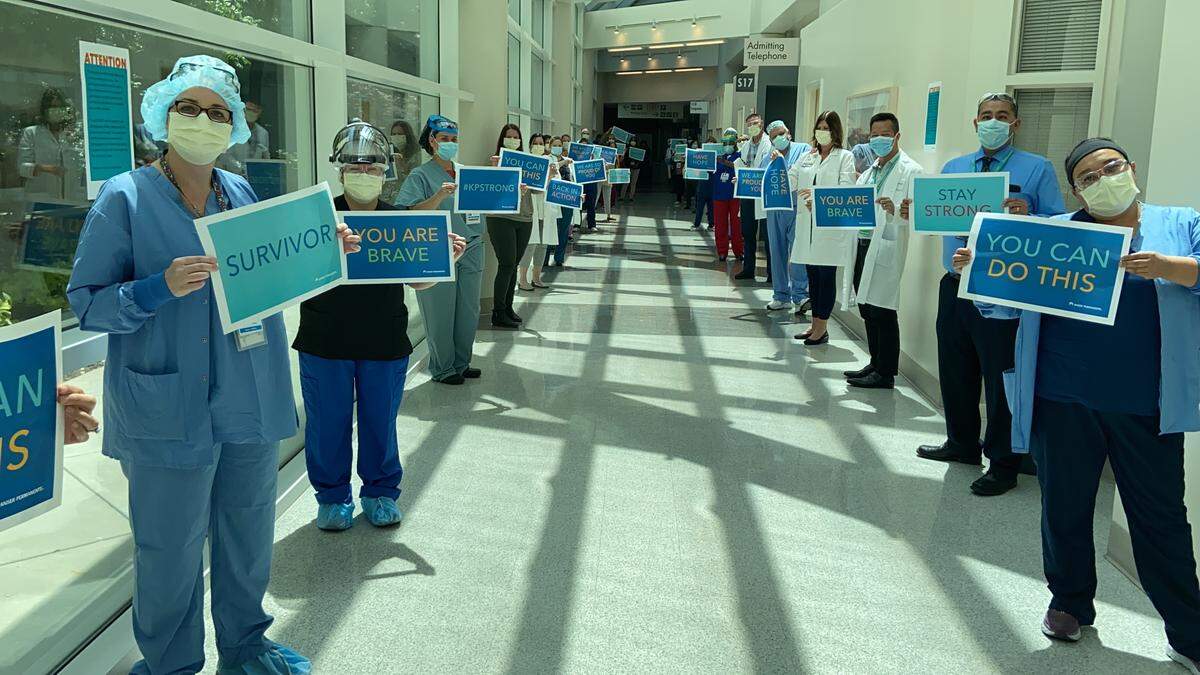 Health care workers at Kaiser Permanente Fresno lined the halls to say goodbye to the Rev. Mark Wallace as he was discharged from the hospital on May 7, 2020 after recovering from COVID-19.