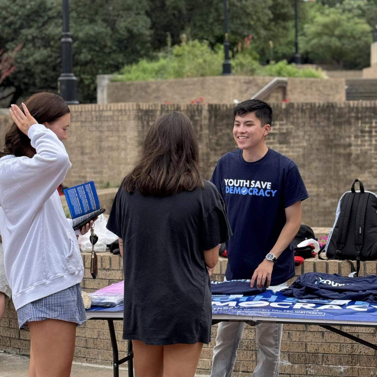 Youth Save Democracy team-member tables at a “Democracy Day” event in Texas.