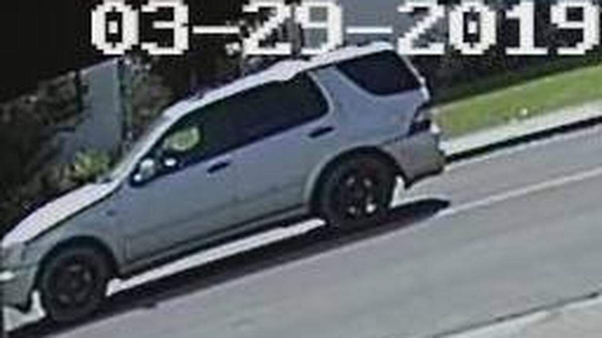 A surveillance image shows a gray Mercedes SUV around the time of a shooting in Reedley that took place Friday in broad daylight.