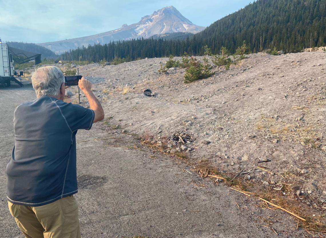 Janusz Warszawski, father of Fresno Bee columnist Marek Warszawski, lines up his iPhone for the perfect shot of Mount Hood during their September 2023 road trip to Oregon.
