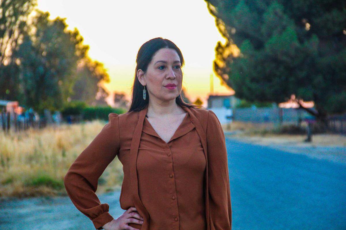 Abigail Solis, a sustainable energy solutions manager with Self Help Enterprises, helps San Joaquin Valley communities during a state pilot project aimed at transitioning communities to cleaner energy.