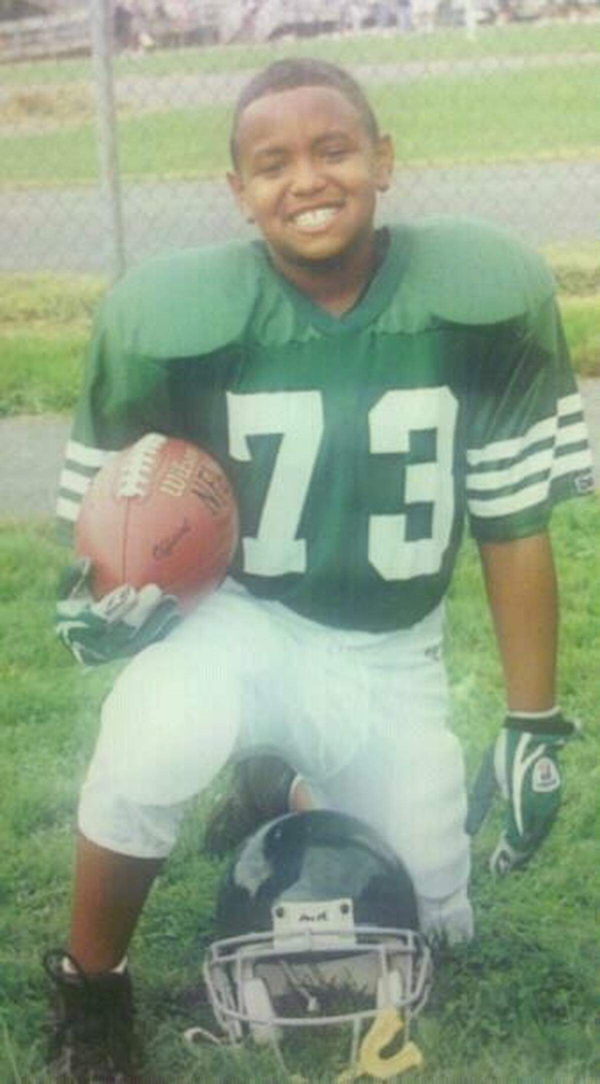 A young Maurice Hurst Jr. poses for a photo when he played on the Canton Bulldogs Pop Warner team.