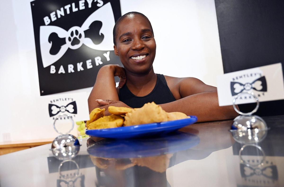 Ebony Brown shows off the features of her new shop Bentley’s Barkery & Barktique which caters to dogs and cats, located in Fig Garden Village. Photographed Wednesday, Aug.10, 2022 in Fresno.