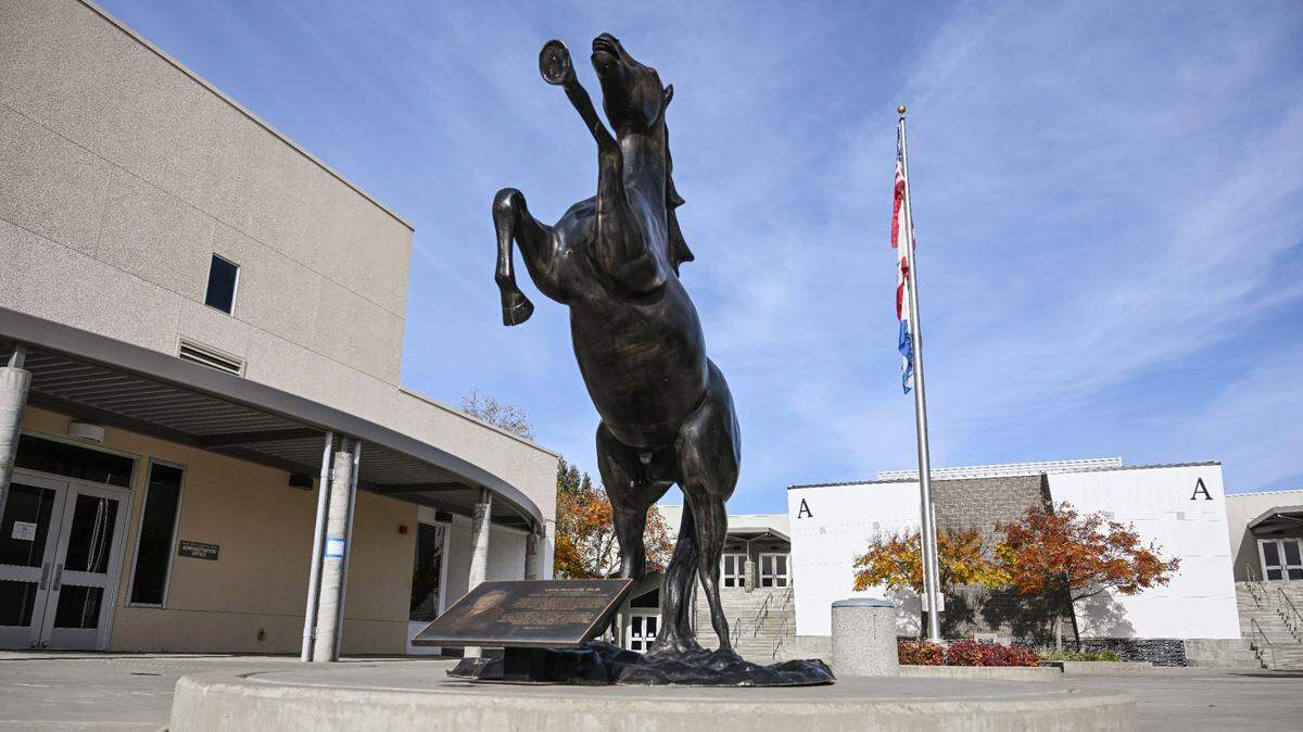 The Clovis North High School bronco statue stands outside the school’s main office on campus on Friday, Dec. 15, 2023.