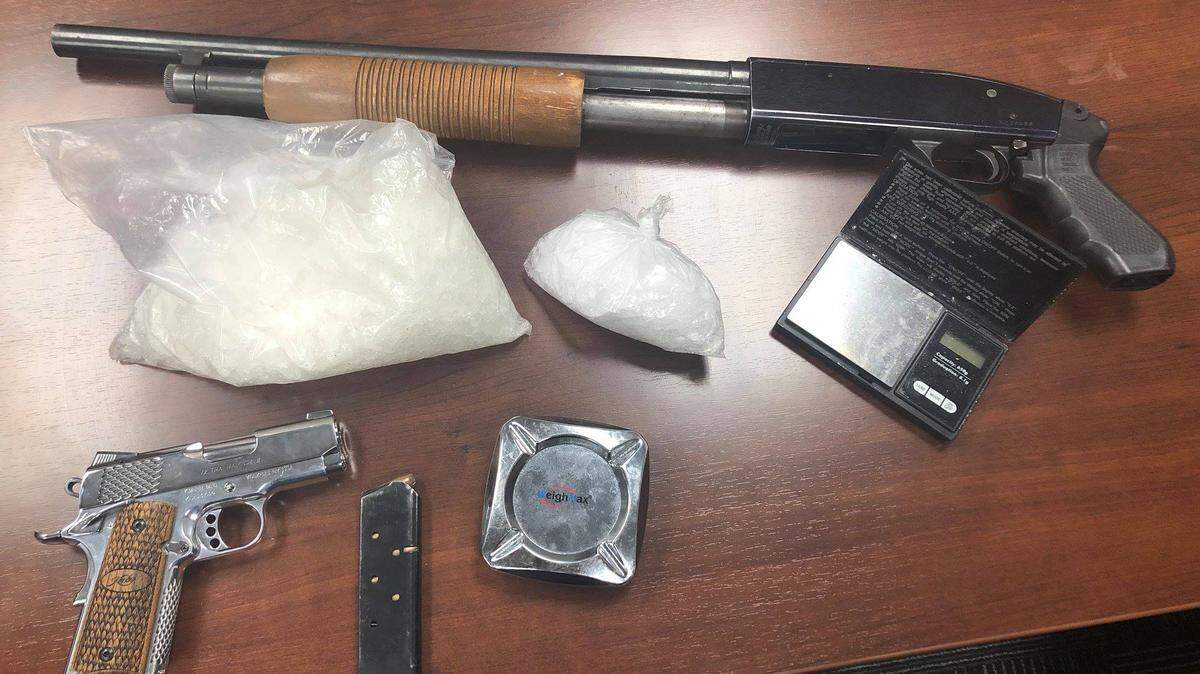 Stolen weapons and and a large quantity of methamphetamine seized Monday by police in Madera.