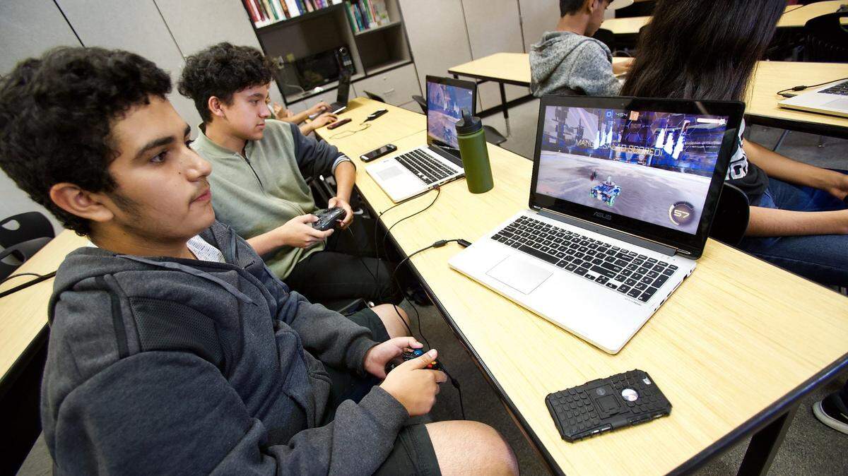 Christian Ledesma demonstrates the video game, Rocket League, at Edison High School in this 2018 photo.