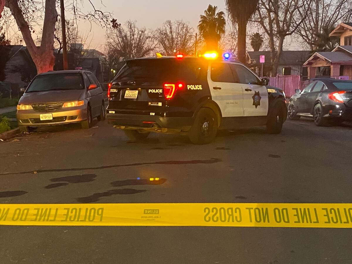 Fresno police investigate a deadly shooting Thursday, Feb. 9, 2023, near Clark Street and Grant Avenue. 