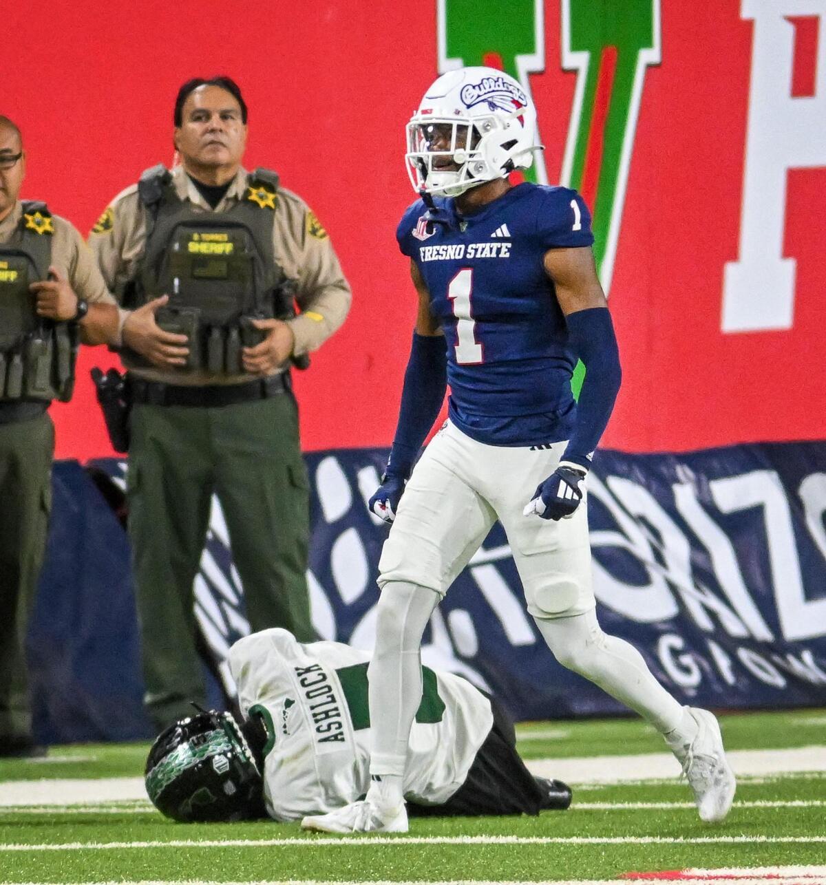 Fresno State’s Cam Lockridge walks off after knocking Hawaii’s Pofele Ashlock to the ground and breaking up a pass during their game with Hawaii at Valley Children’s Stadium in Fresno on Saturday, Nov. 2, 2024. Lockridge was called for targeting on the play and ejected.