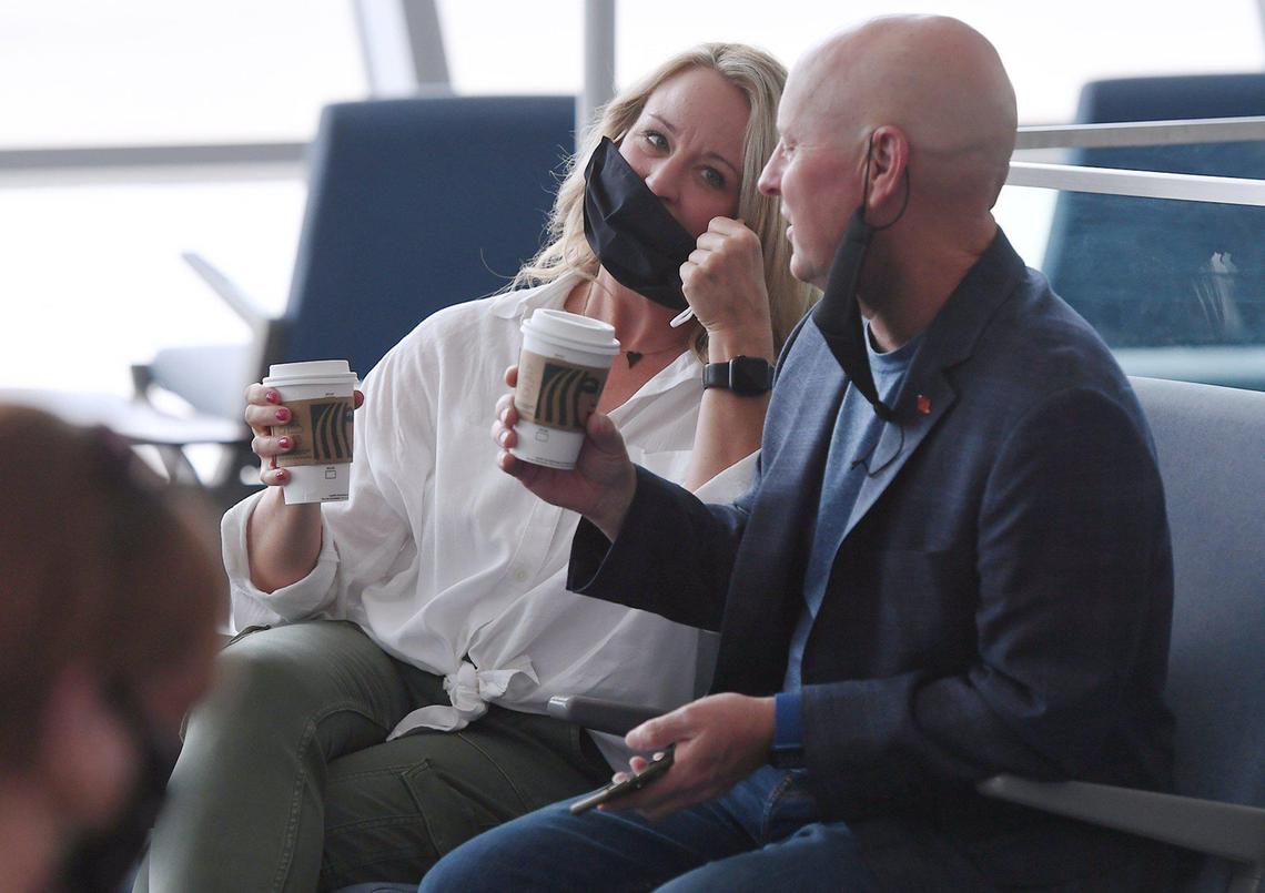 Natalie Welch, left, and her husband Dennis Welch, right, wait to board Southwest Airlines’ inaugural flight leaving Fresno Yosemite International Airport for Las Vegas Sunday morning, April 25, 2021 in Fresno.