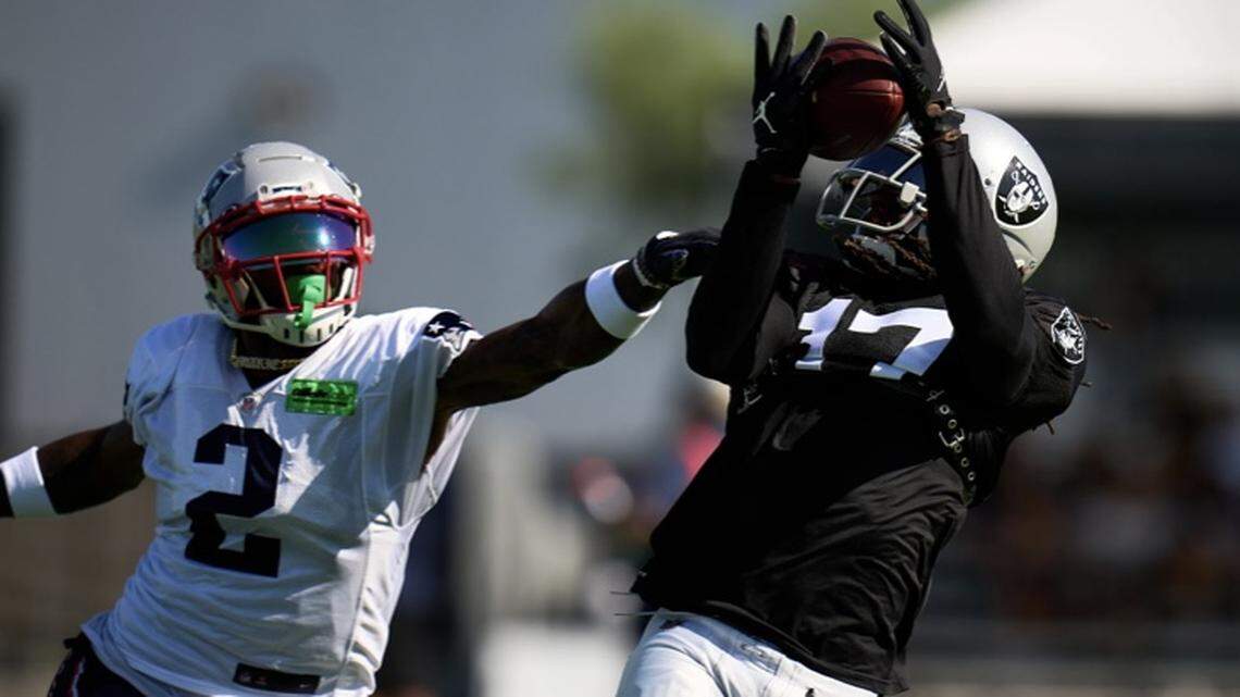 Las Vegas Raiders wide receiver Davante Adams makes a catch against the New England Patriots during a joint practice on Tuesday, Aug. 23, 2022.