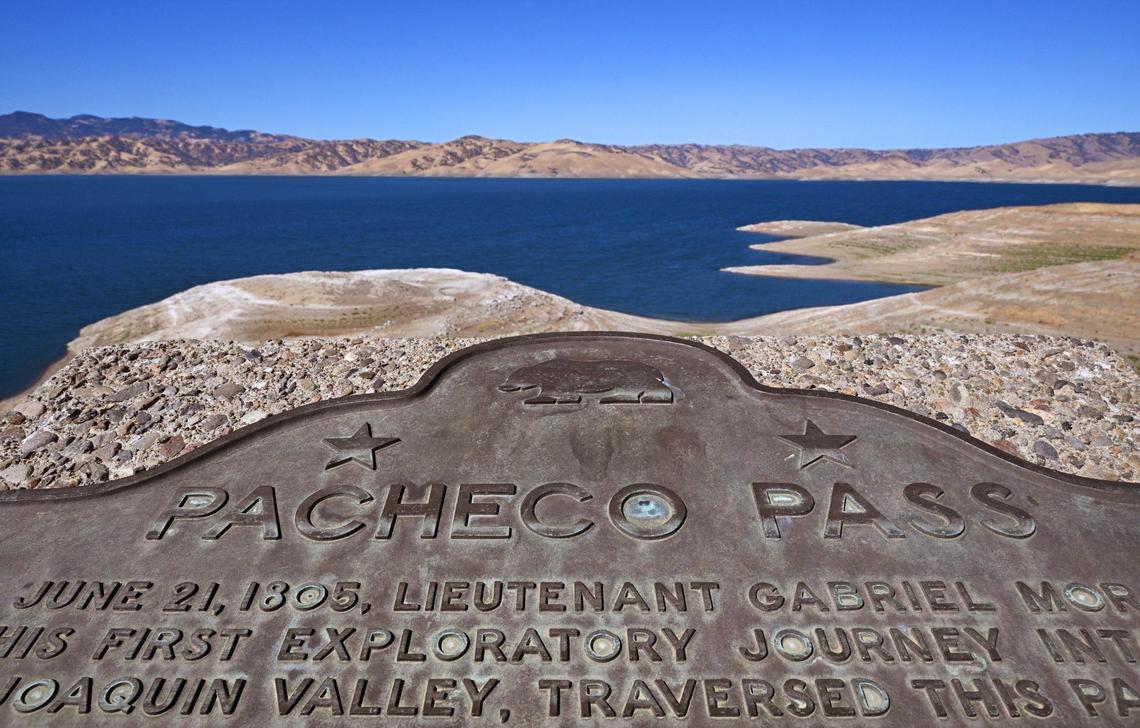 A plate describing the history of Pacheco Pass is seen overlooking San Luis Reservoir from the Romero Visitor Center Friday, Aug. 16, 2024.